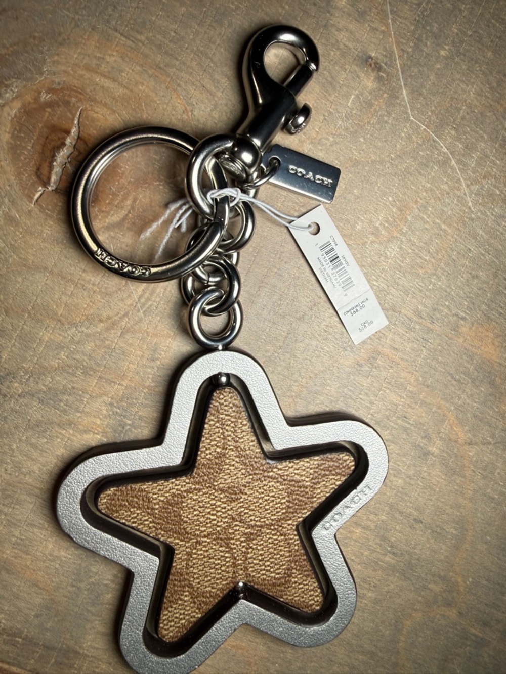 Coach Spinning Star Bag Charm in Signature Canvas. NWT